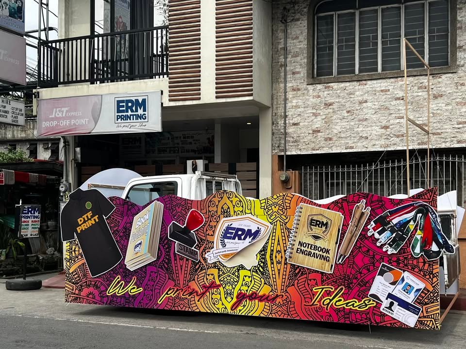 ERM Printing storefront and a colorful showcase of custom shirts, stickers, notebooks, lanyards, and printed products